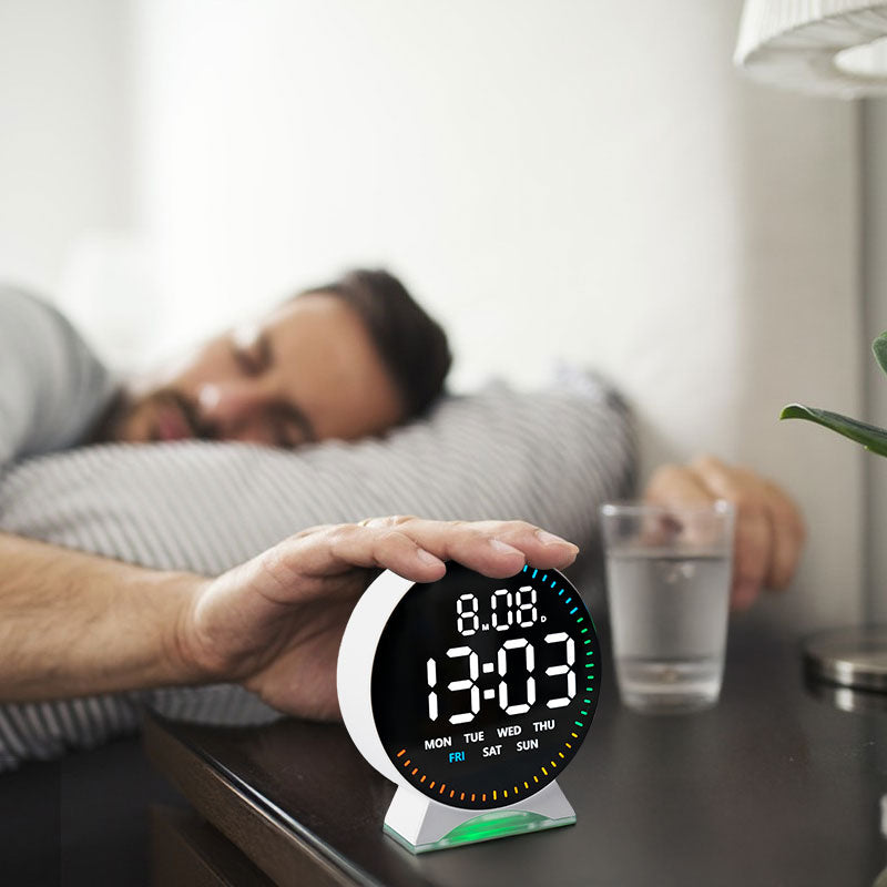 LED alarm clock with custom jump-second display, ambient light, auto-dimming USB desk clock.