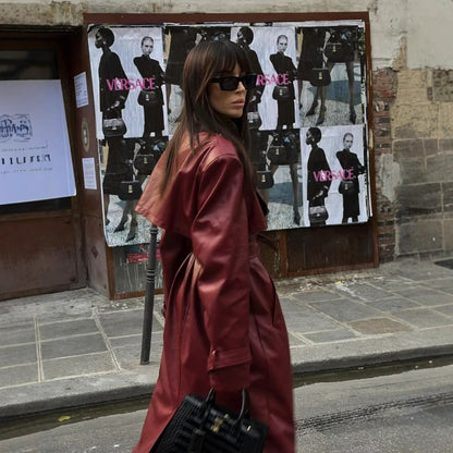 Medium length leather jacket with loose fit for women