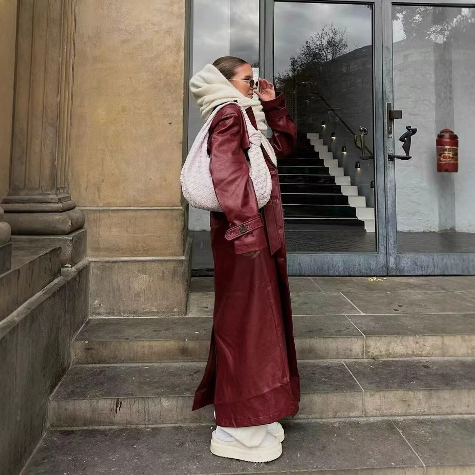 Medium length leather jacket with loose fit for women